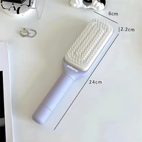 Brosse à cheveux auto-nettoyant™
